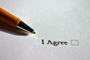 Paper with "I Agree" and checkbox
